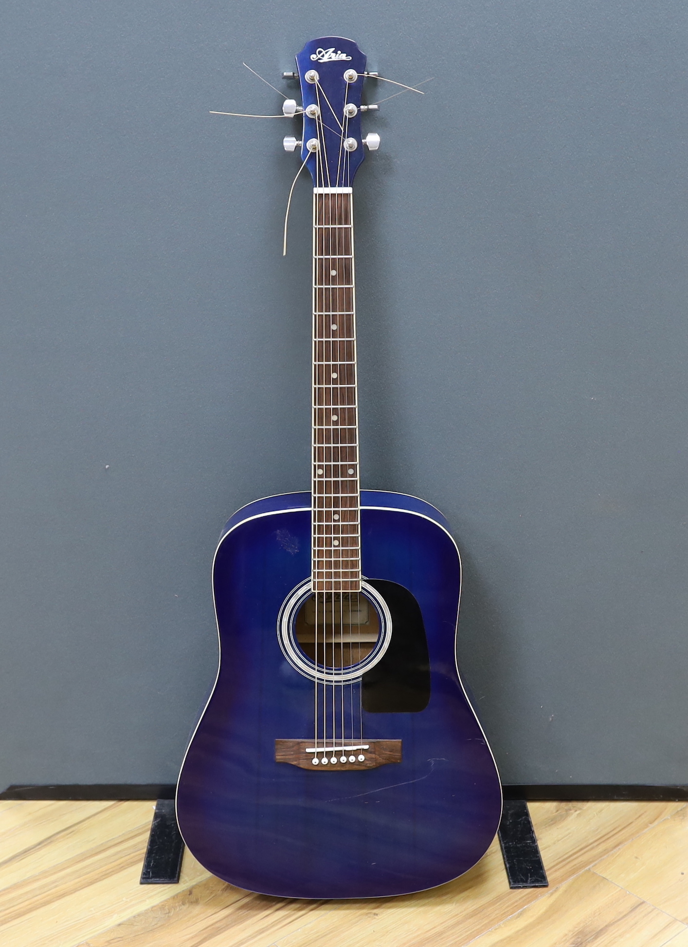 An Aria acoustic guitar, model no.AWN-15BLS